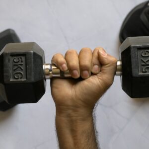 a hand holding a key chain